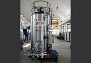 Vertical thermal oil boiler type RV from 50,000 up to 1.500,000 kcal/h for temperature up to 320°C, with double pumps.