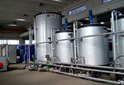 Series of vertical mixers for modified bitumen