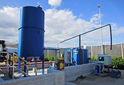 Cationic and anionic emulsion production plant, capacity 5,000 lt, with 10,000 lt storage silos and loading arm.